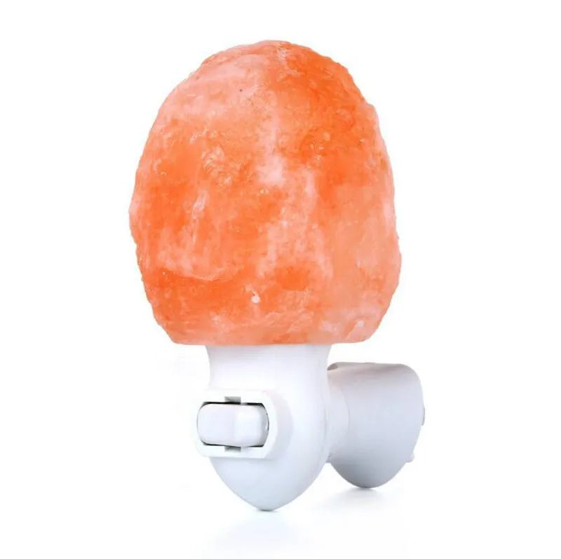 Handcrafted, natural crystal Himalayan salt lamp with a plug that releases negative ions and a warm white glow for home decor and air purification.